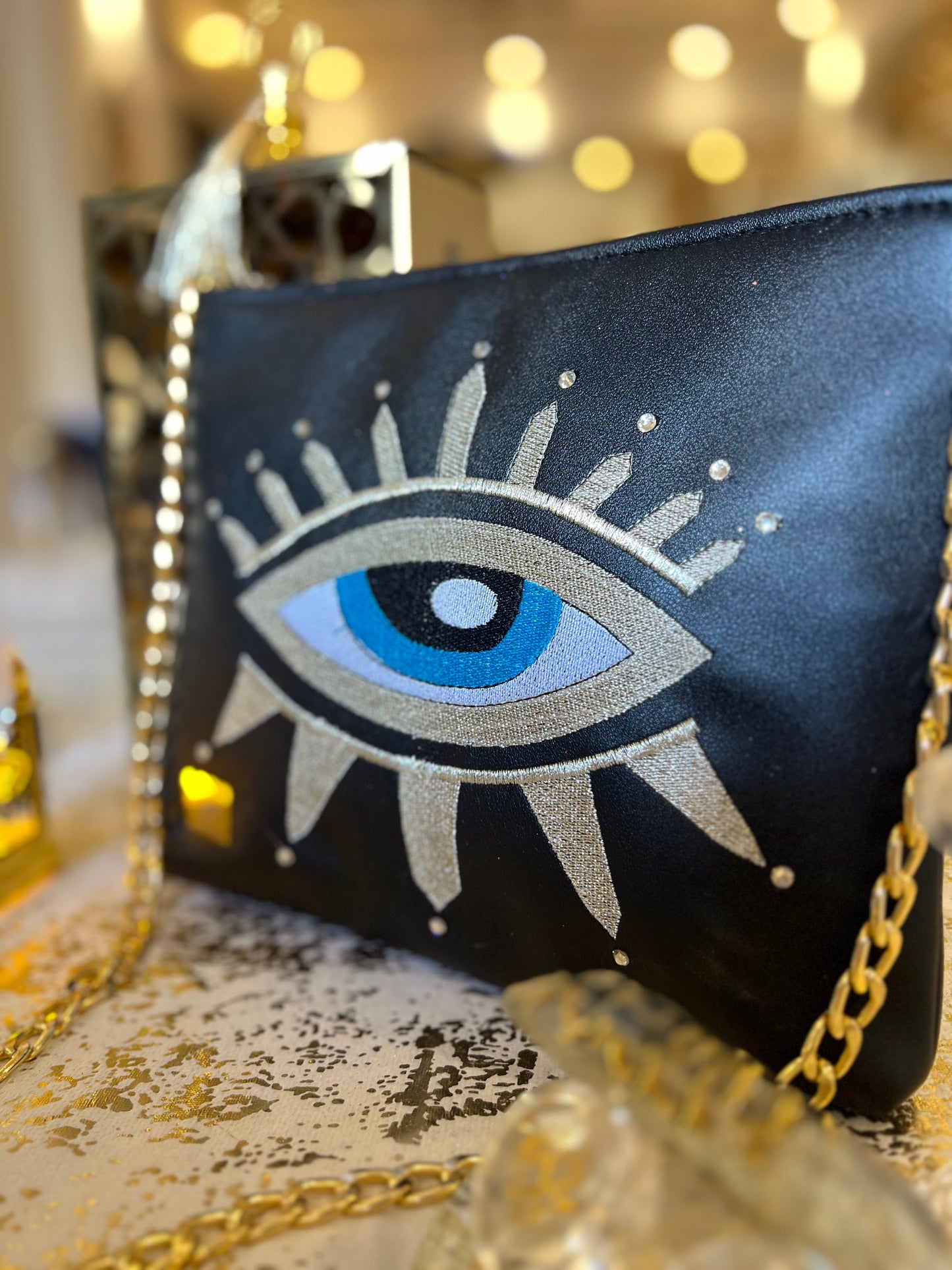 Evil eye clutch and cross bag