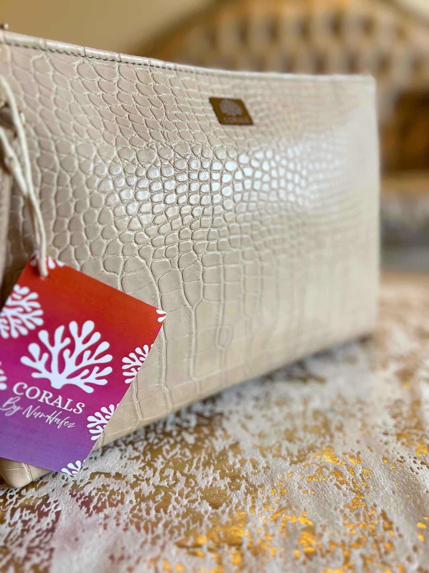Beige croc clutch