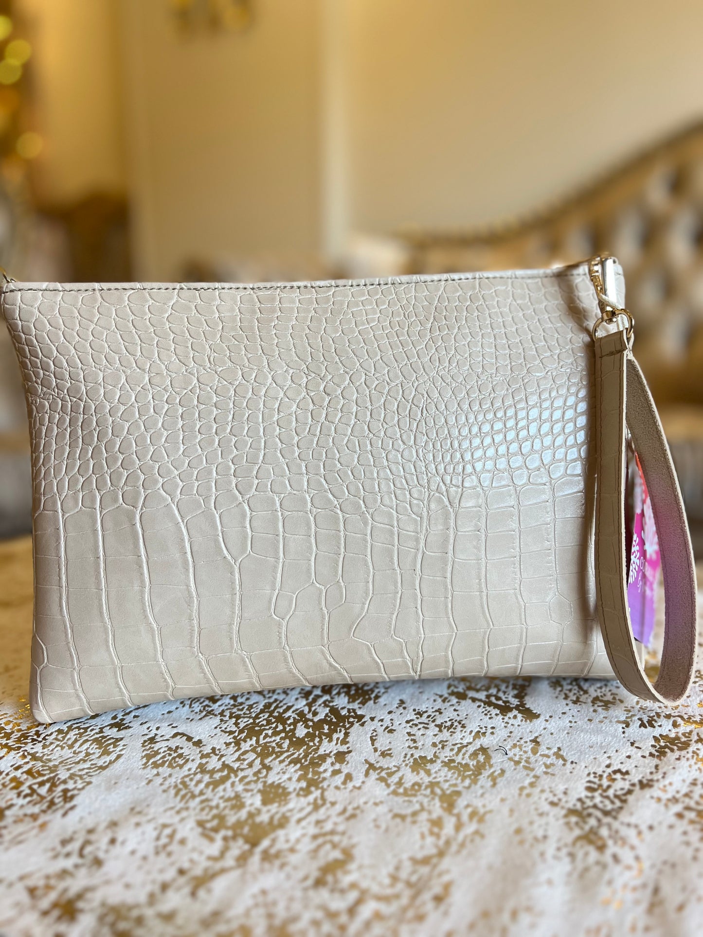 Beige croc clutch