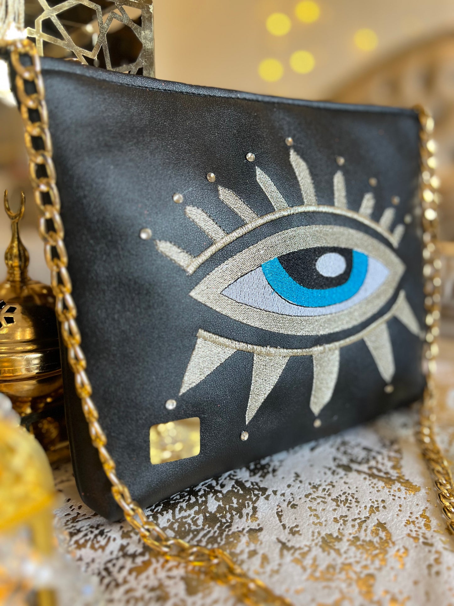 Evil eye clutch and cross bag