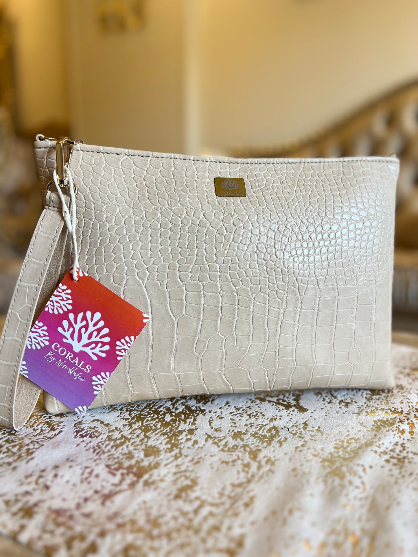 Beige croc clutch
